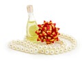 Perfume, pearls, bow Royalty Free Stock Photo