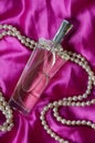 Perfume and pearls Royalty Free Stock Photo