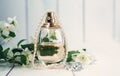 Perfume and string of pearls Royalty Free Stock Photo