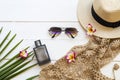 Perfume ,sunglasses ,hat ,crochet ,coconut leaf and flowers frangipani of accessories lifestyle woman Royalty Free Stock Photo