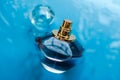 Perfume bottle under blue water, fresh sea coastal scent as glamour fragrance and eau de parfum product as holiday gift, luxury Royalty Free Stock Photo