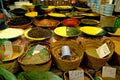 Perfumes and fragrances in the air in front of a typical grocery shop on a street in Tunis, Tunisia