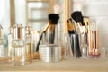 Perfumes and makeup products on dressing Royalty Free Stock Photo