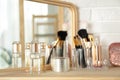 Perfumes and makeup products on table Royalty Free Stock Photo