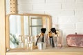 Perfumes and makeup products on table Royalty Free Stock Photo