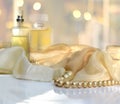 Perfumes and pearl beeds Royalty Free Stock Photo