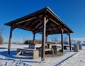 Pergola, garden pavilion is equipped with a metal grill.