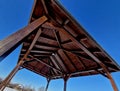 Pergola, garden pavilion is equipped with a metal grill.