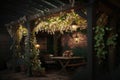 pergola with hanging lights, vines, and flowering plants