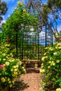Pergola and stone bench in the  rose garden Royalty Free Stock Photo