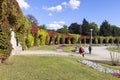 Pergola in Wroclaw on an autumn sunny day, colorful leaves of virginia creeper on a background of blue sky, Wroclaw, Poland