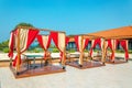 Pergolas with tables and chairs in restaurant