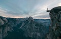 Perhaps the best view of glacier point where this unknown adventurer dares to stand on the edge Royalty Free Stock Photo