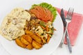 Peri peri Chicken with Button mushroom gravy, Saute Vegetables, Spicy fried Potatoes with Tomato Lettuce Salad