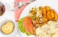 Peri peri Chicken with Button mushroom gravy, Saute Vegetables, Spicy fried Potatoes with Tomato Lettuce Salad Royalty Free Stock Photo