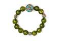 Peridot bracelet Beads green ore lucky stone decorate whit Chakra amulet Royalty Free Stock Photo