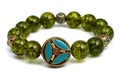 Peridot bracelet Beads green ore lucky stone decorate whit Chakra amulet Royalty Free Stock Photo