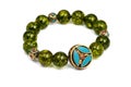 Peridot bracelet Beads green ore lucky stone decorate whit Chakra amulet Royalty Free Stock Photo