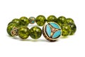 Peridot bracelet Beads green ore lucky stone decorate whit Chakra amulet Royalty Free Stock Photo