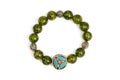 Peridot bracelet Beads green ore lucky stone decorate whit Chakra amulet Royalty Free Stock Photo