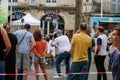 Perigueux, Dordogne, France June 03 2023 : United in Sports: Spectators Watching a Rugby Match Broadcast in a Public Square