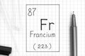 The Periodic table of elements. Handwriting chemical element Francium Fr with black pen, test tube and pipette