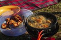 Perkedel jagung or bakwan jagung, corn fritters that is in fry in Portable stove. Indonesian cuisine