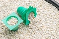 Perlite with green cup Royalty Free Stock Photo