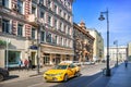 Perlov`s tea house and a taxi on Myasnitskaya street in Moscow