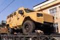 Armored car with holes in armor on the railway flatcar Royalty Free Stock Photo