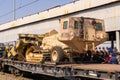 Self-propelled mine flail on the railway flatcar