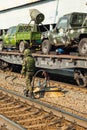 Soldier guarding the mobile exhibition of trophies of the Russian army during the Syrian campaign