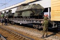 Soldier guarding themobile exhibition of trophies of the Russian army during the Syrian campaign