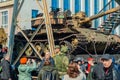 Captured tank of terrorists with artisanal reactive armor on a railway flatcar Royalty Free Stock Photo