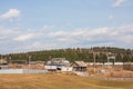 Perm, Russia - April 16,2016: Wooden houses in village and a pas Royalty Free Stock Photo