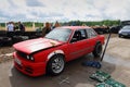 PERM, RUSSIA - JUL 22, 2017: Red competitor car and tools