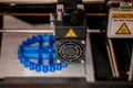 3D printer printhead while printing detail close-up