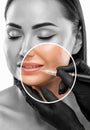 Permanent make-up for eyebrows and lips of beautiful woman in beauty salon. Closeup beautician doing eyebrows tattooing. arrows on Royalty Free Stock Photo