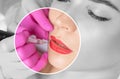 Permanent make-up for red Lips of beautiful blonde woman in beauty salon. Closeup beautician doing tattooing Lips. Female Royalty Free Stock Photo