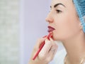 Permanent makeup burgundy pencil contour lips