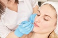 Permanent makeup. Beauty spa procedure. young woman. Face tattoo Royalty Free Stock Photo