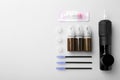 Permanent makeup equipment kit on light grey background, flat lay Royalty Free Stock Photo