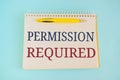 Permission Required text written on a notebook with pencil Royalty Free Stock Photo
