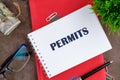 Permit word written in the manager\'s address book Royalty Free Stock Photo