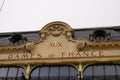 Aux dames de france logo brand and text sign town center upmarket building facade