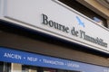 Bourse de l`immobilier human sign text and logo brand real estate shop broker office