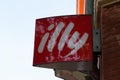 Illy coffee shop red text sign and brand logo cafe Italian coffee makers bar