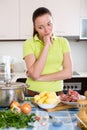 Perplexed woman with meat Royalty Free Stock Photo