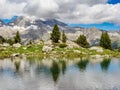 Perramo lake and Perdiguero peak at baclground in Benasque Valley, Spain