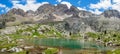 Perramo lake and Perdiguero peak at baclground in Benasque Valley, Spain